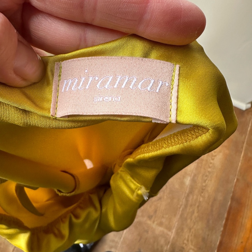 Greenish yellow satin dress.